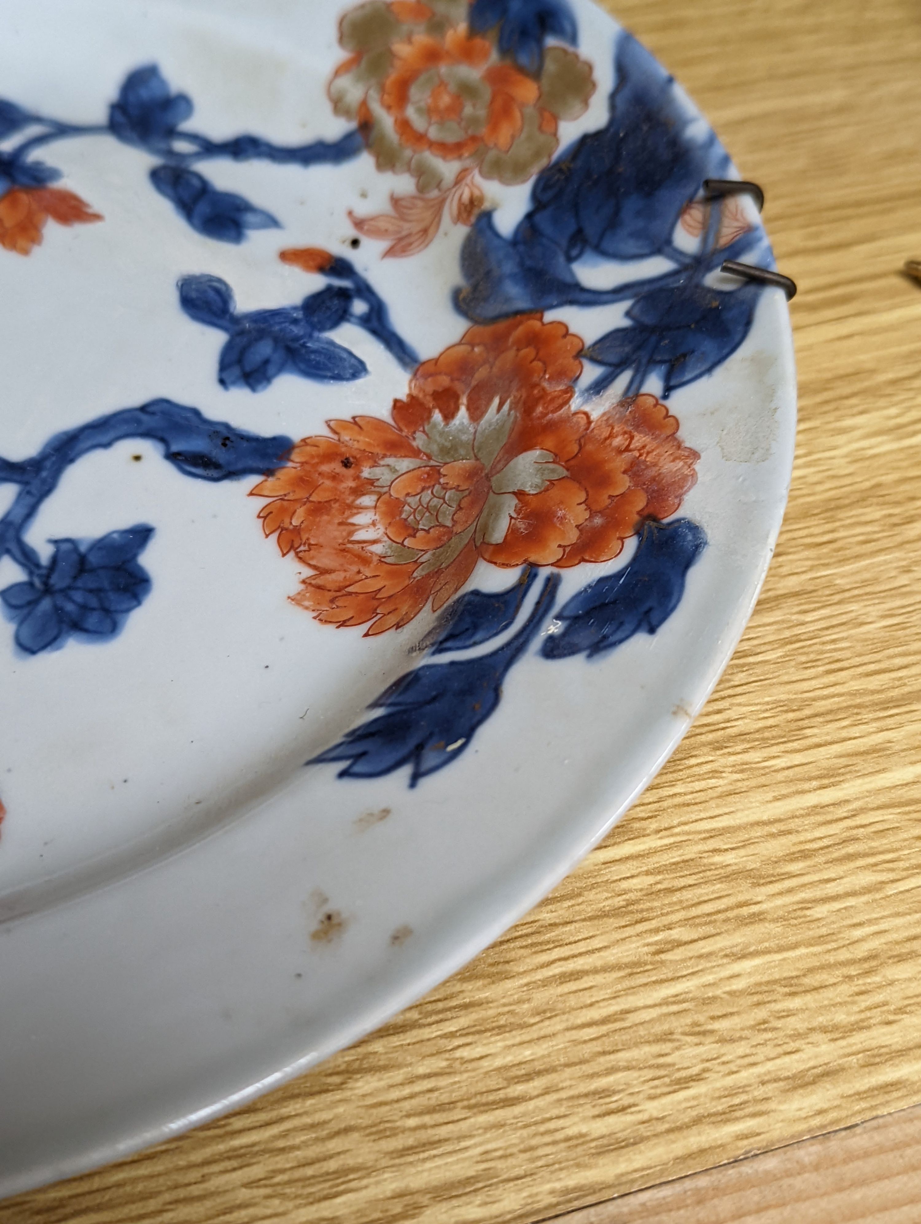 An 18th century Chinese famille rose dish, crackle-glaze stem cup, Beijing glass tea bowl and a Chinese Imari plate. Largest 24cm